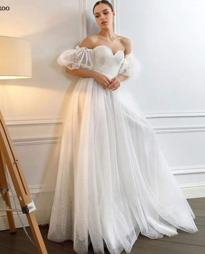 Abiti da sposa principessa dellinnamorato Gittler con maniche a sbuffo in tulle glitterato