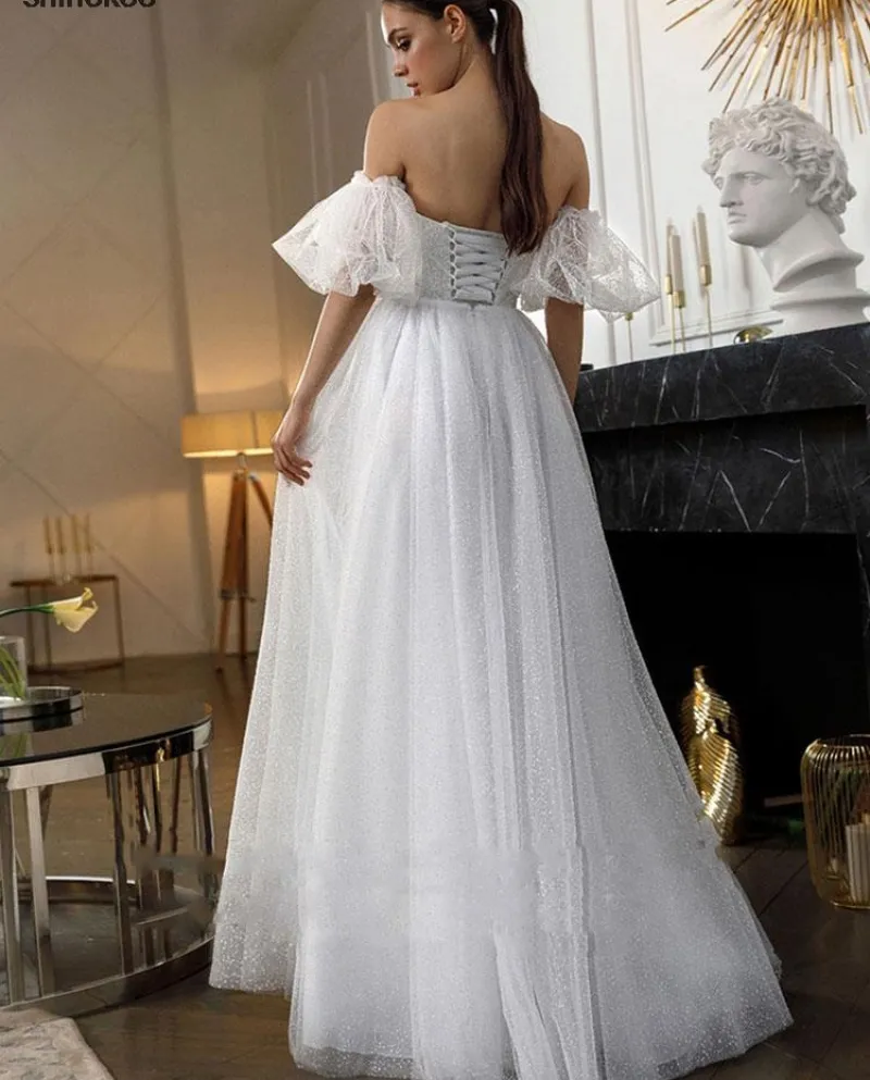 Abiti da sposa principessa dellinnamorato Gittler con maniche a sbuffo in tulle glitterato