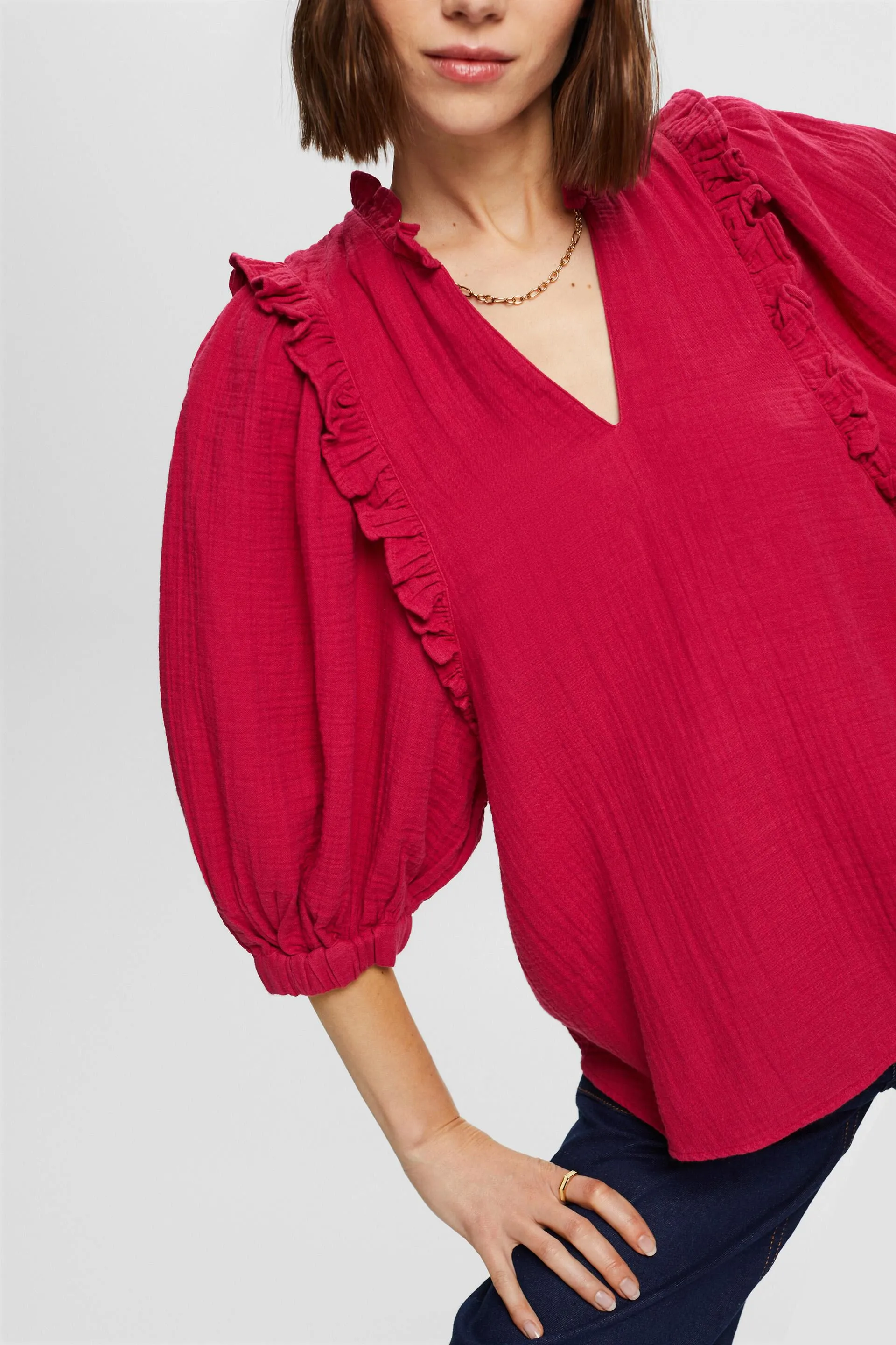 Blusa in cotone garzato con bordo arricciato