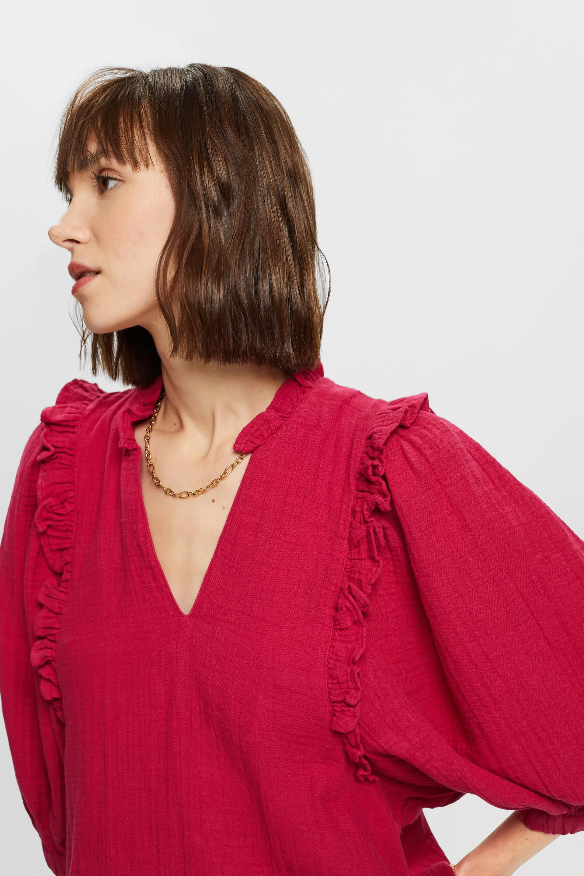 Blusa in cotone garzato con bordo arricciato