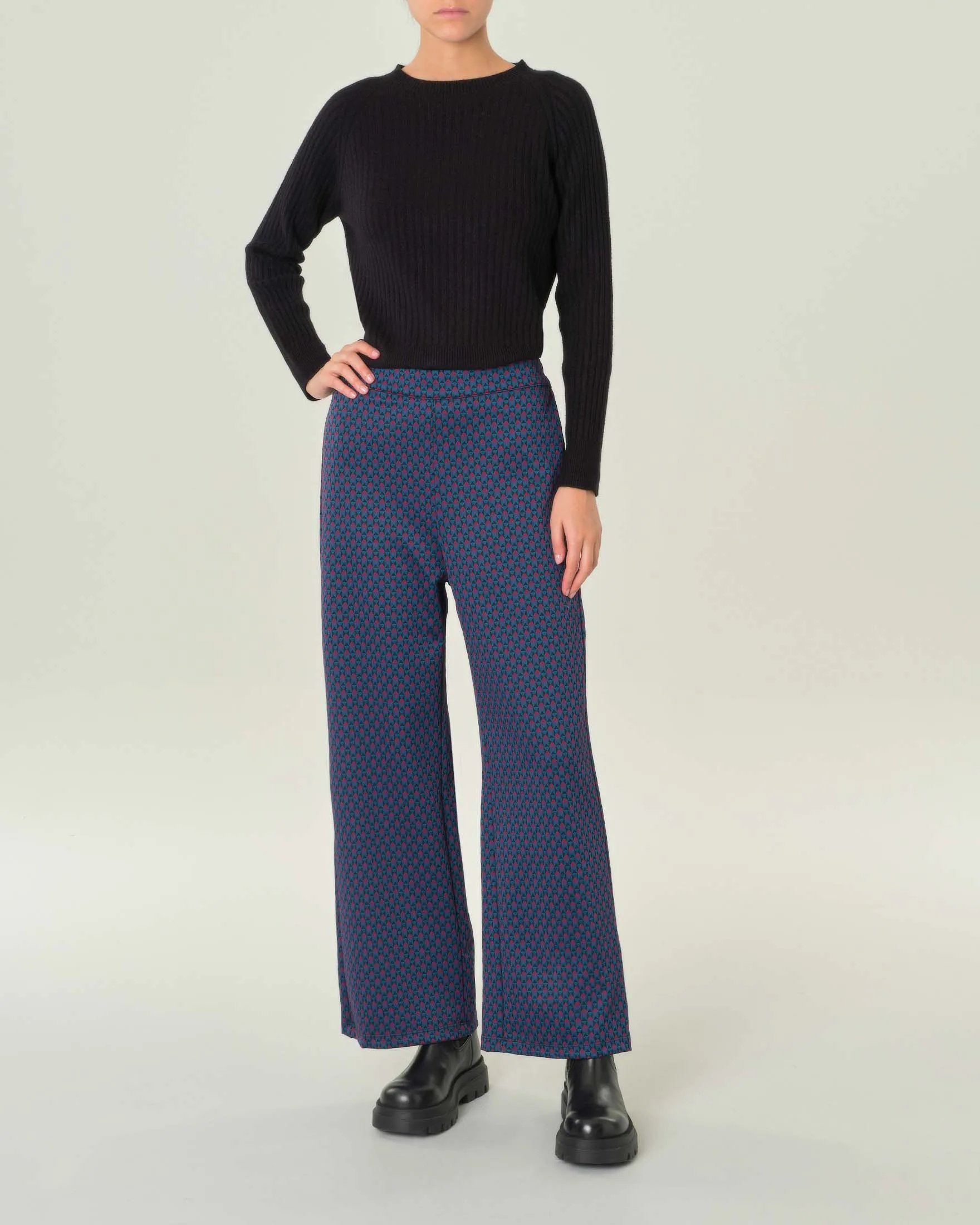 Pantalone palazzo ottanio in jersey a fantasia geometrica nera e fucsia